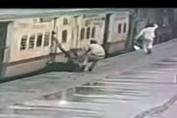 Rpf constable rescues old woman from falling under the moving train