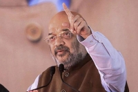Amit shah summoned by bengal court after mamata banerjee s nephew sues him