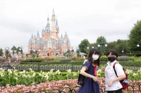 Shanghai disneyland closes as covid cases rise shenzhen business centre reopens after week