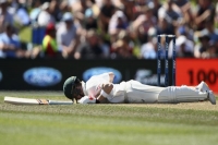 Australian captain steve smith felled by neil wagner bouncer