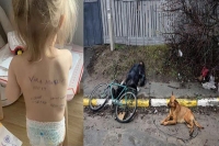 Heartbreaking ukrainian mother writes family details on toddler s back in case they re killed