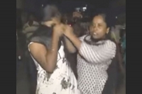 Wife thrashes husband mistress on road in vijayawada