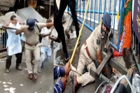 Kolkata cop cornered thrashed by mob holding bjp flags during protest