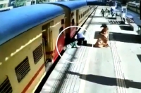 Mumbai woman slips trying to board moving train at vasai road railway station