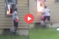 Woman filmed setting fire to home with residents inside