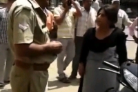 Woman thrashes police officer for allegedly molesting her in saharanpur