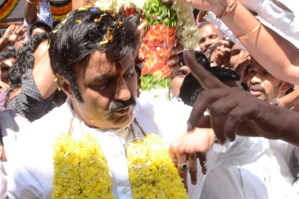 Legend balakrishna makes halchal in movie theaters
