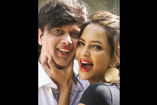 Manchu lakshmi lip lock with her husband