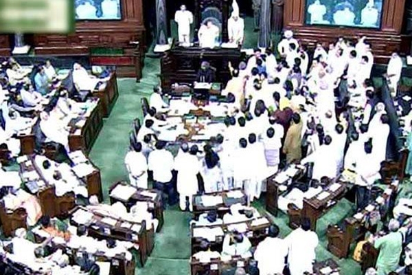 Trs mps slogans against polavaram ordinance in lok sabha