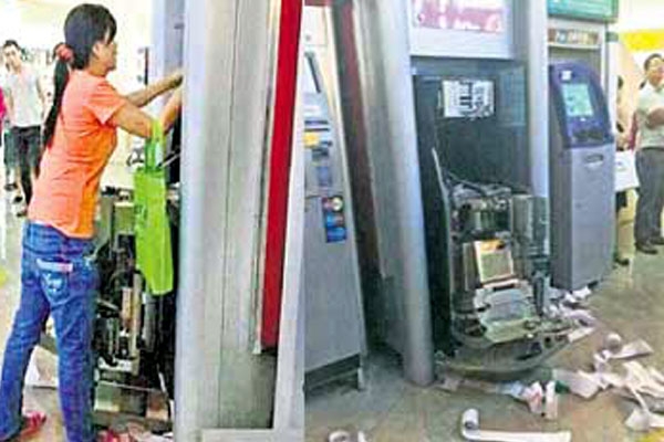 China woman pulled out atm machine for not dispensing money