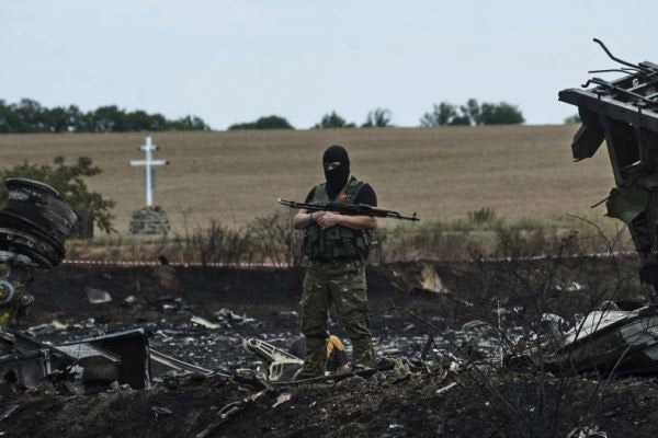 219 bodies from malaysian plane debris taken away by insurgents